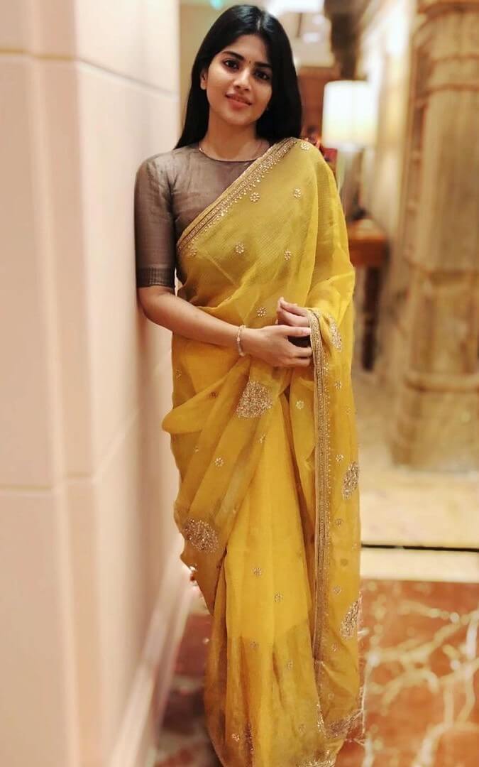 Dazzling Megha In Yellow Saree Outfit