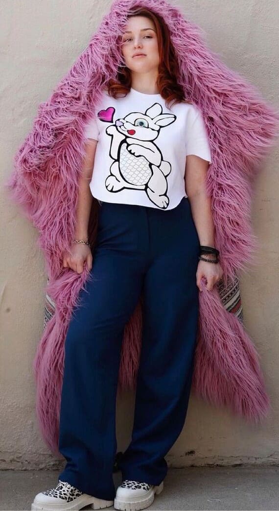 Fabulous Jennifer In Rabbit Print White Tee Paired With Purple Pants