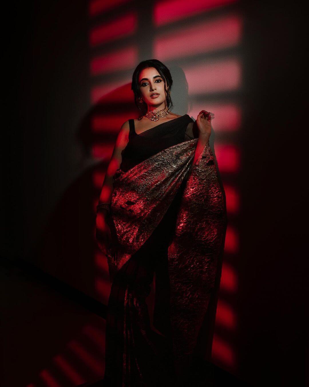 Priyanka Mohan Dazzling Look In Black Saree With Kundan Choker Neck Piece