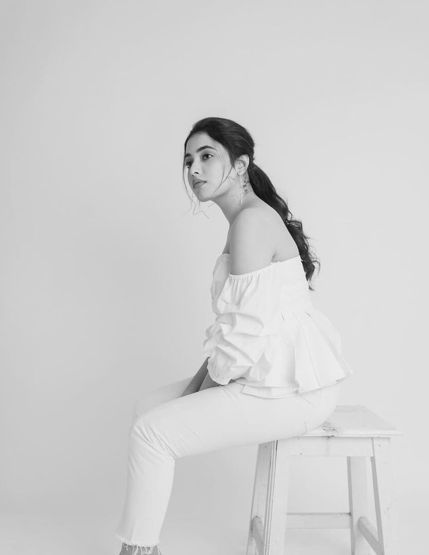 Priyanka Mohan In a White Off Shoulder Ruffle Top with White Pants Can Be Your Casual Outfit Too Priyanka Arul Mohan Traditional Outfit Looks Collection