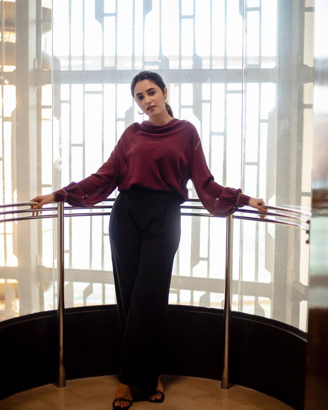 Priyanka Mohan Office Going Look In Maroon Top With Black Pant Outfit