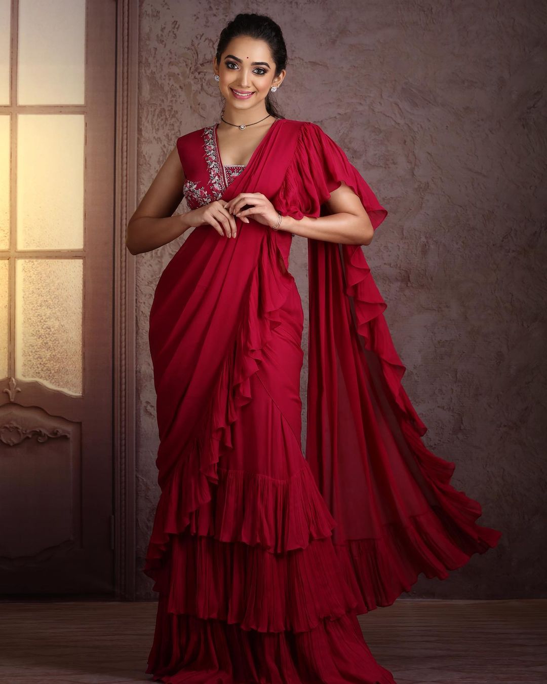 Saanve Megghana Simple And Elegant Look In Red Ruffle Saree