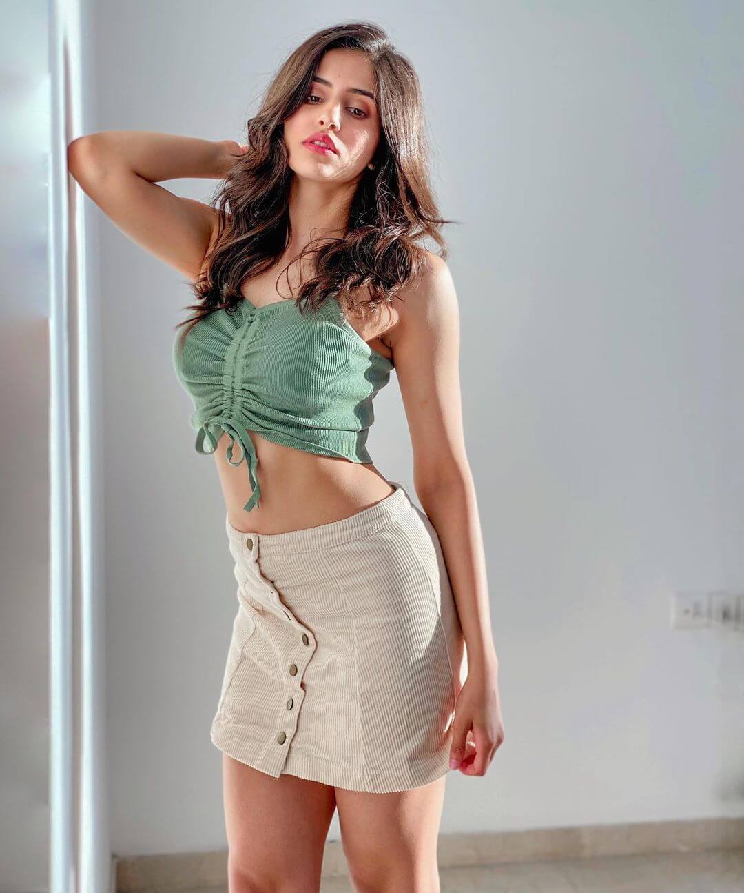 Sakshi Malikk  In Mini Denim Skirt with Green Crop Top Can Be Your Causal Outfit Too Sakshi Malik Hot and Sexy Outfit Look