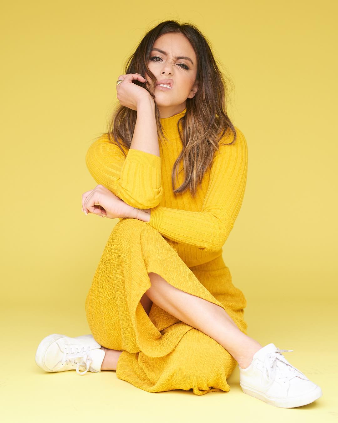 Sassy Chloe In Yellow Colored Winter Fit Paired With White Sneakers