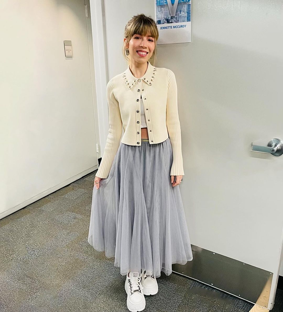 Sassy Jennette In Cream Colored Cardigan Paired With Grey Ruffly Pleated Long Skirt