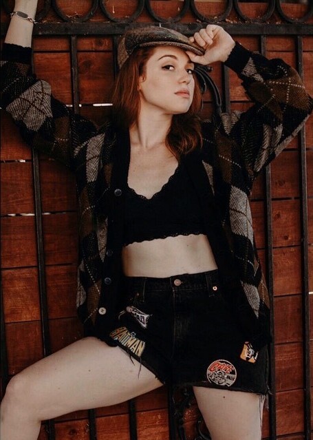 Stunning Babe In Black Colored Bralette Top & Denim Shorts Topped With Checkered Coat