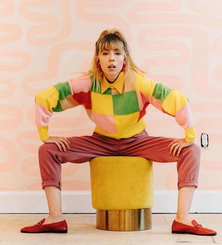 Stunning Jennette In Multi-colored Sweater Paired With Beautiful Pants & Brown Loafers