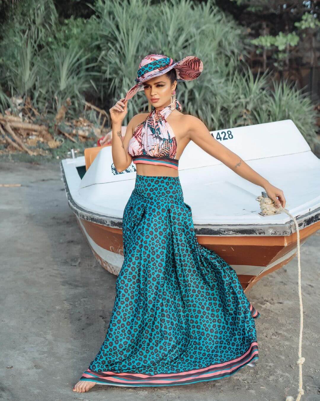 Aashika Goradia Vintage Look In Blue Tiger Print Skirt With Halter Neck Crop Top & Hat