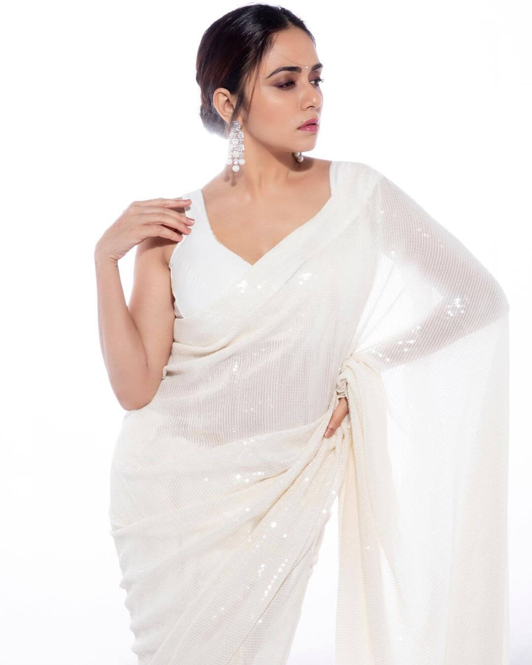 Amruta Khanvilkar In White Sequin Saree