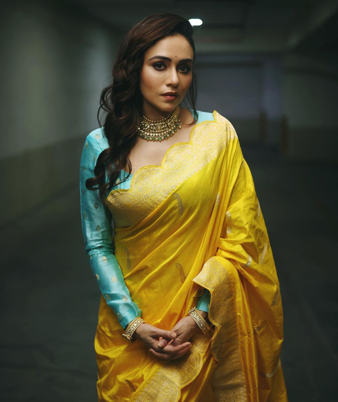 Amruta Khanvilkar In Yellow Saree With Contrasting Full Sleeves Sky Blue Blouse