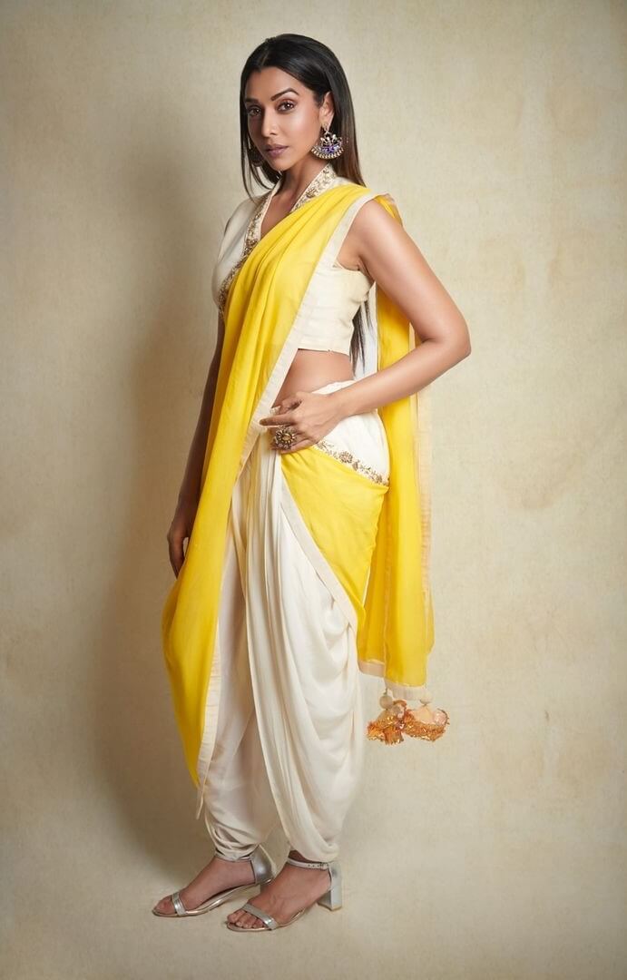 Anupriya Elegant Look In White And Yellow Dhoti Saree Outfit