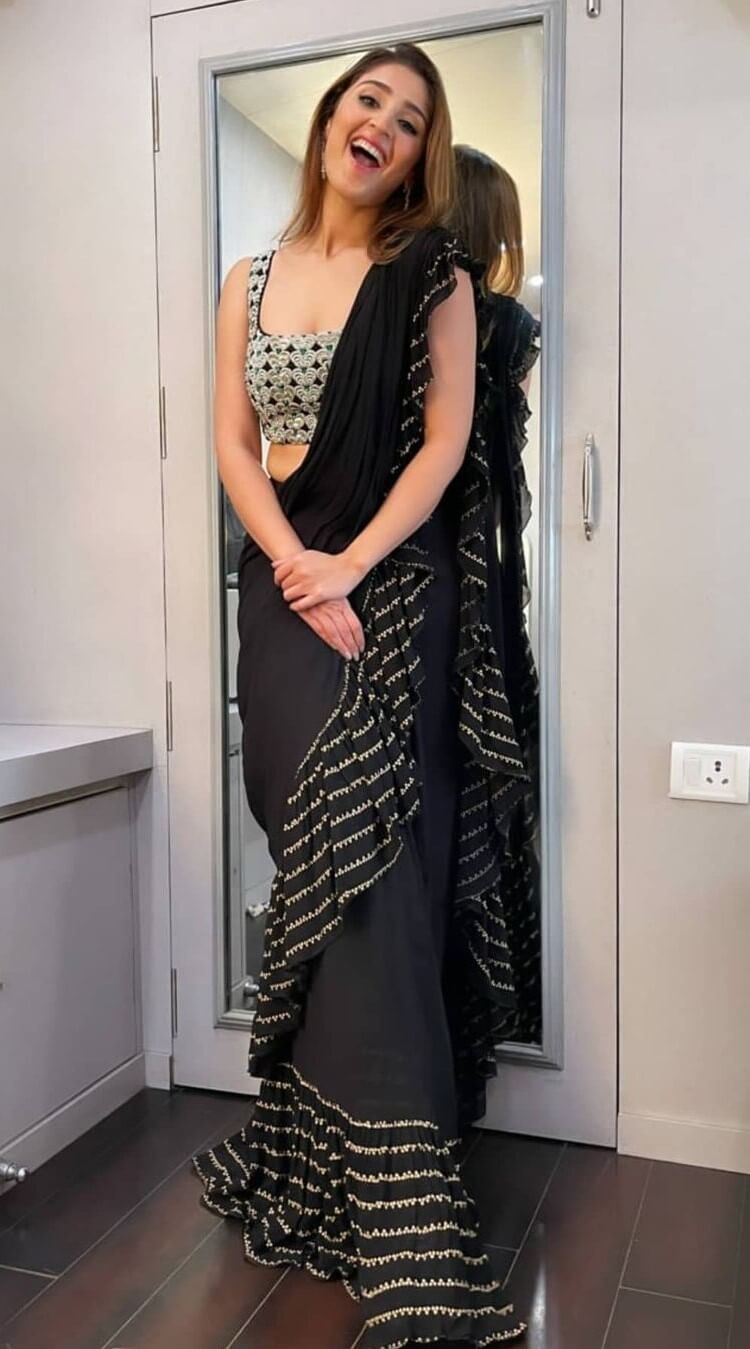 Dhvani Bhanushali Look Fabulous In Black Ruffle Saree Outfit