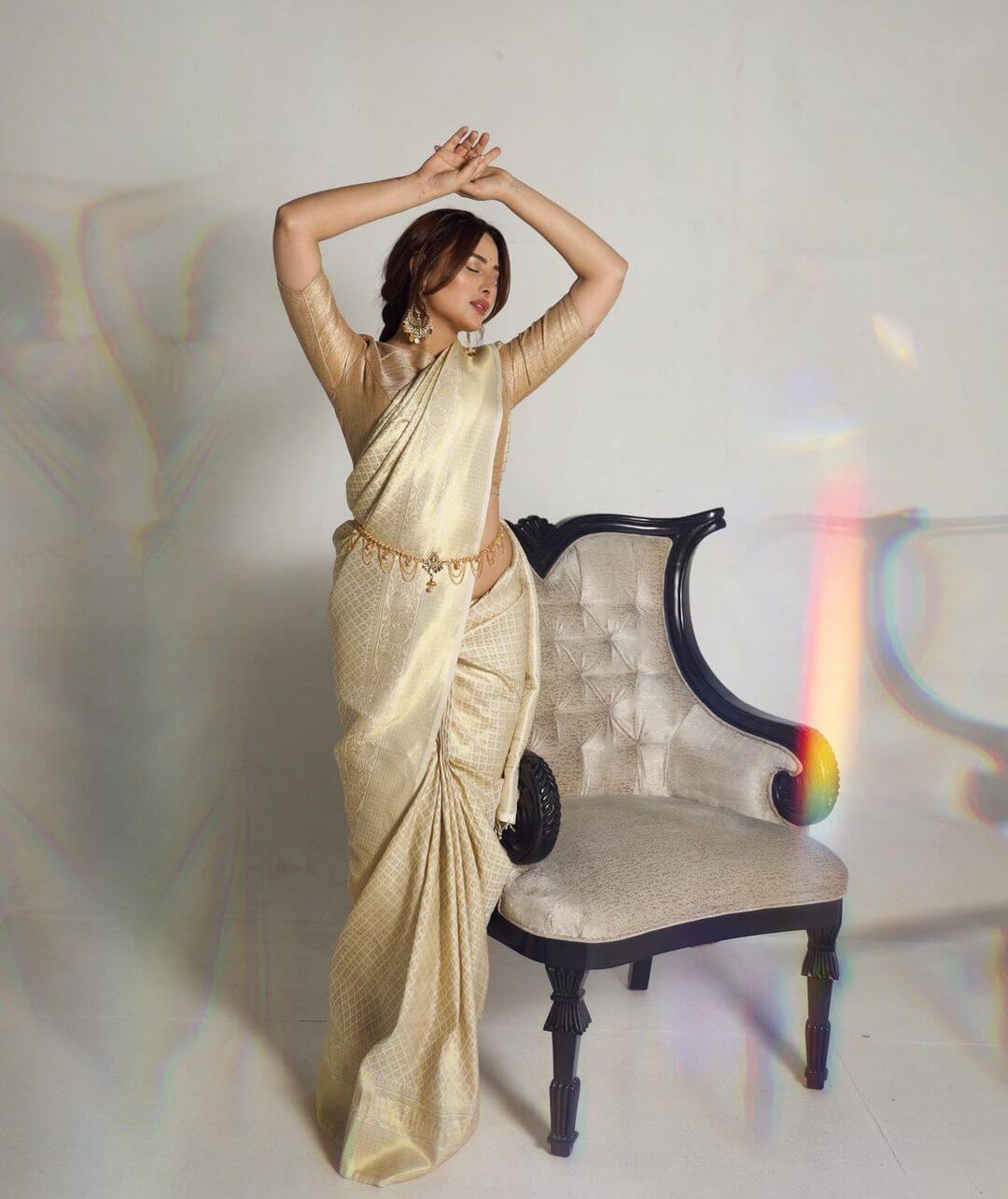 Mahira Sharma In Traditional Golden Saree Outfit