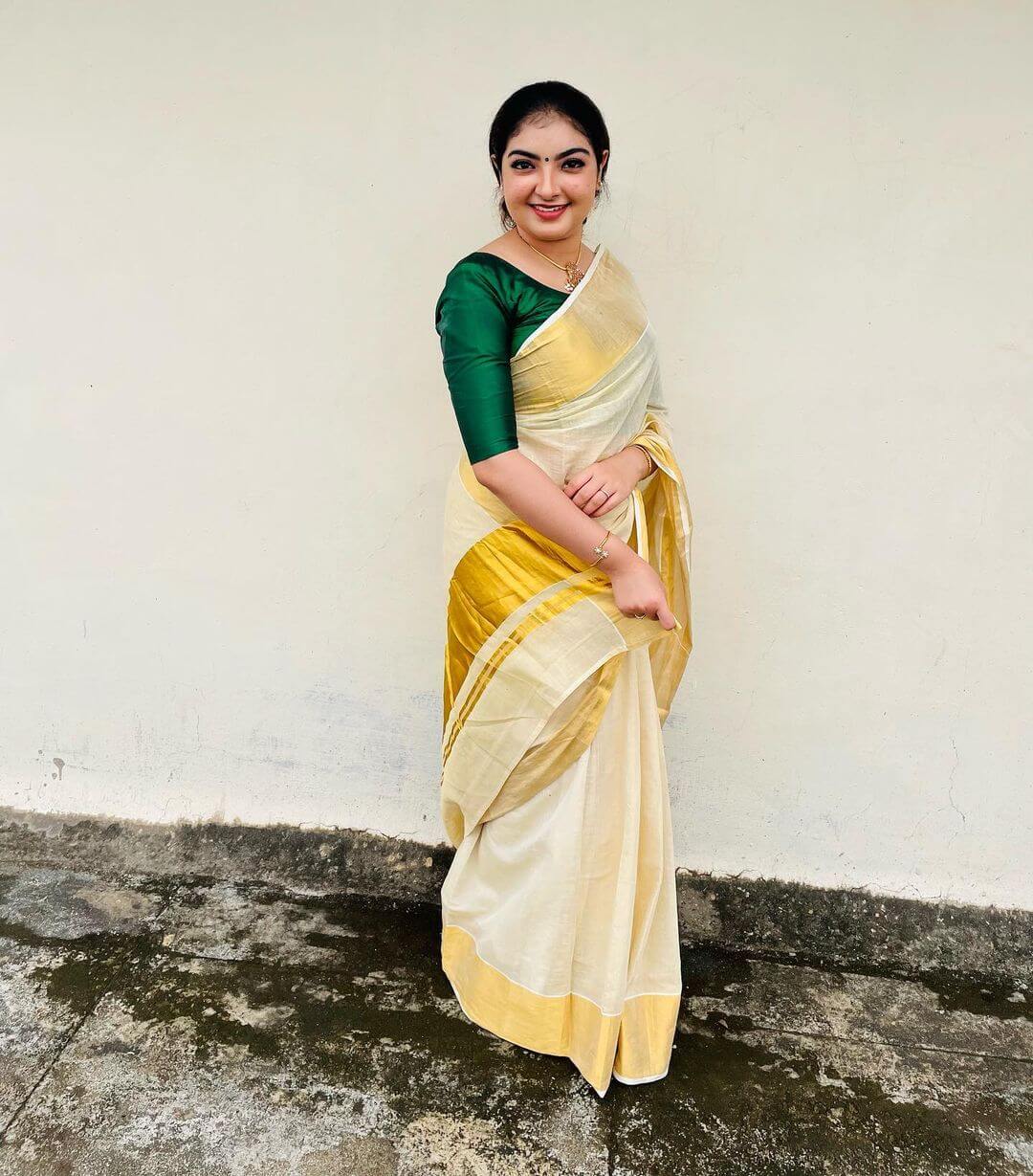 Malavika Nair In Traditional South Indian White Silk Saree With Green Blouse