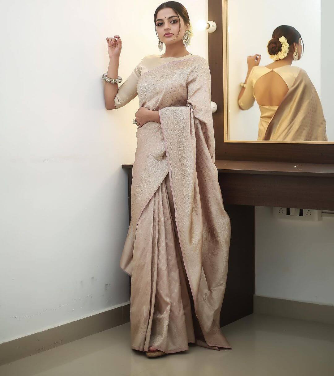 Nikhila Vimal In Ivory Silk Kanjivaram Saree Outfit