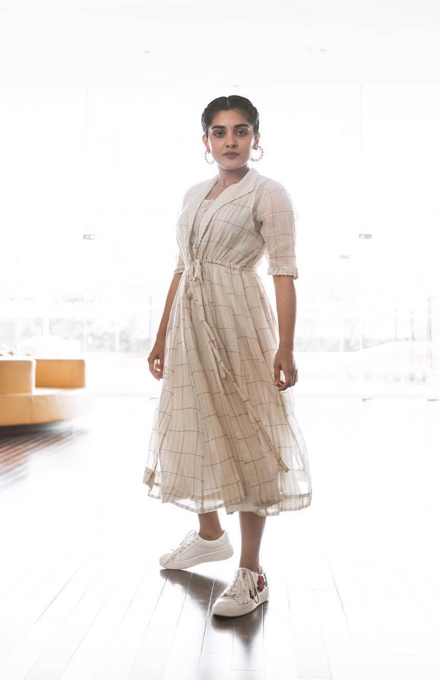 Nivetha Thomas Chic Look In White Tie-Up Outfit