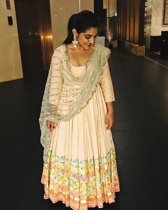 Nivetha Thomas Graceful Look In Pistal Colour Anarkali Suit Outfit