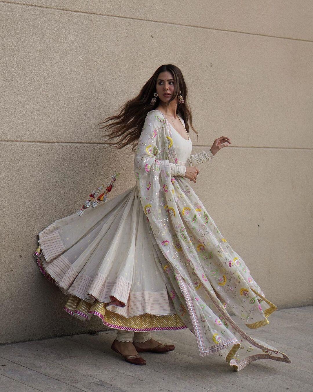 Sonam Bajwa In White Full Flare Anakarli Suit Outfit