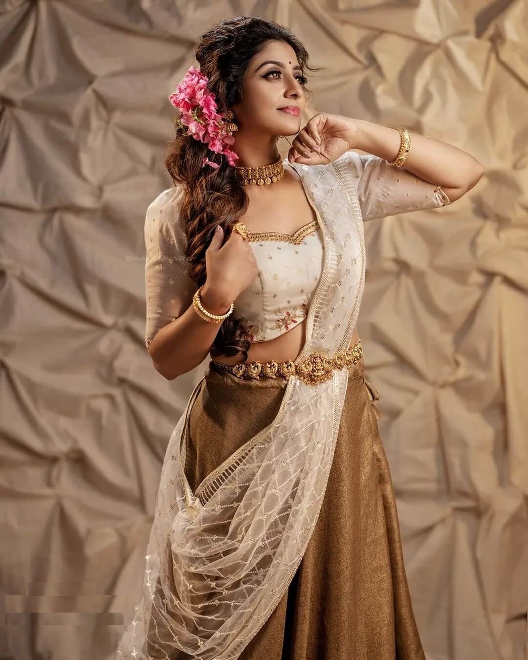 Athmiya Rajan In Traditional Ethnic White & Golden Lehenga  & Gold Jewellery