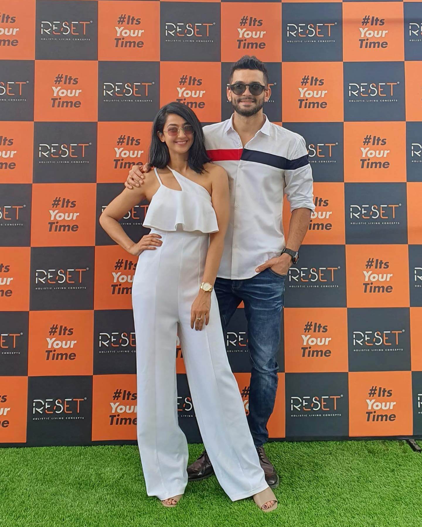 Aindrita Ray In White One Side Shoulder Noddle Strap Jumpsuit With Her Bae In White Shirt Are Setting Major Couples Goal