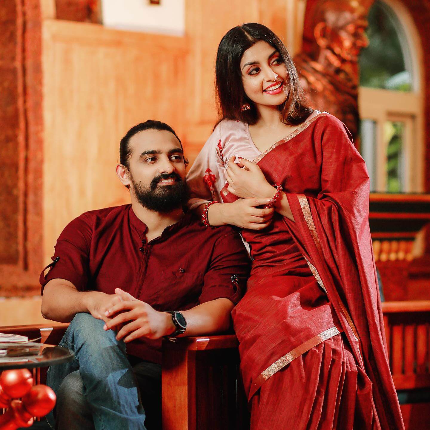 Athmiya Rajan In Red Solid Saree Paired With Golden Blouse Twinning Along With Her Bae