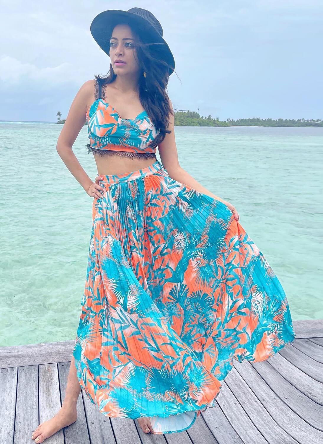 Janani Iyer Sexy Beach Look In Blue Crop Top With Long Accordian Pleated Skirt