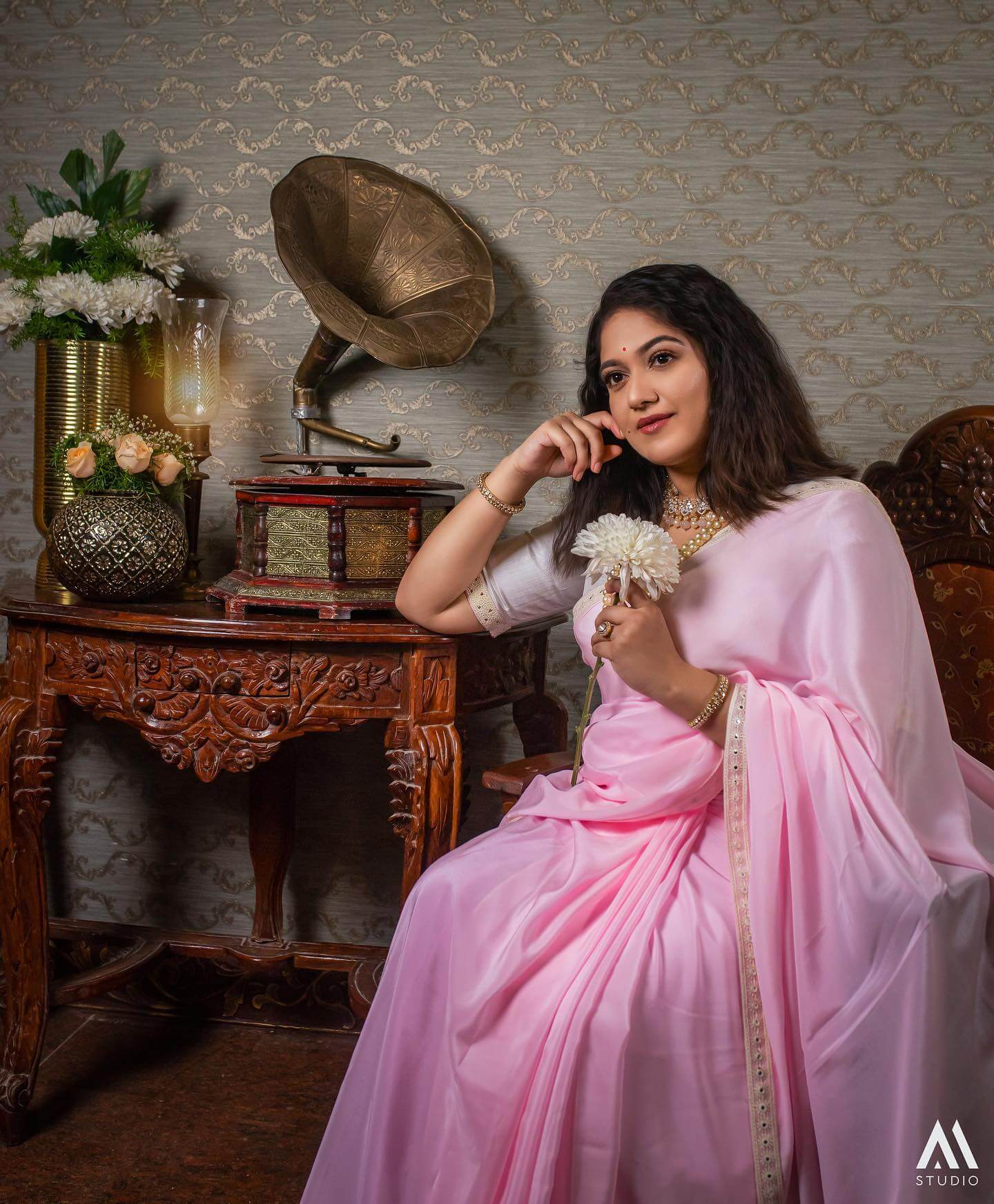 Meghana Raj  Elegant Look In Pink Solid Saree & Blouse