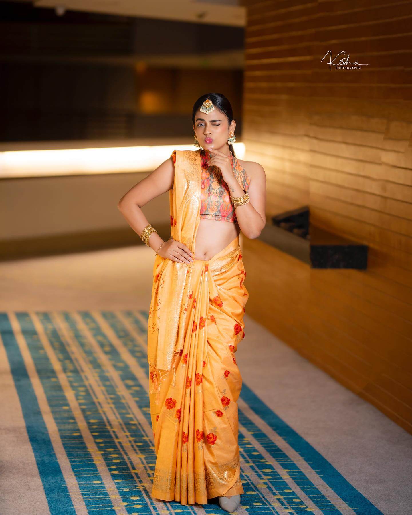 Nandita Swetha In Yellow Floral Print Saree Paired With Halter Neck Blouse