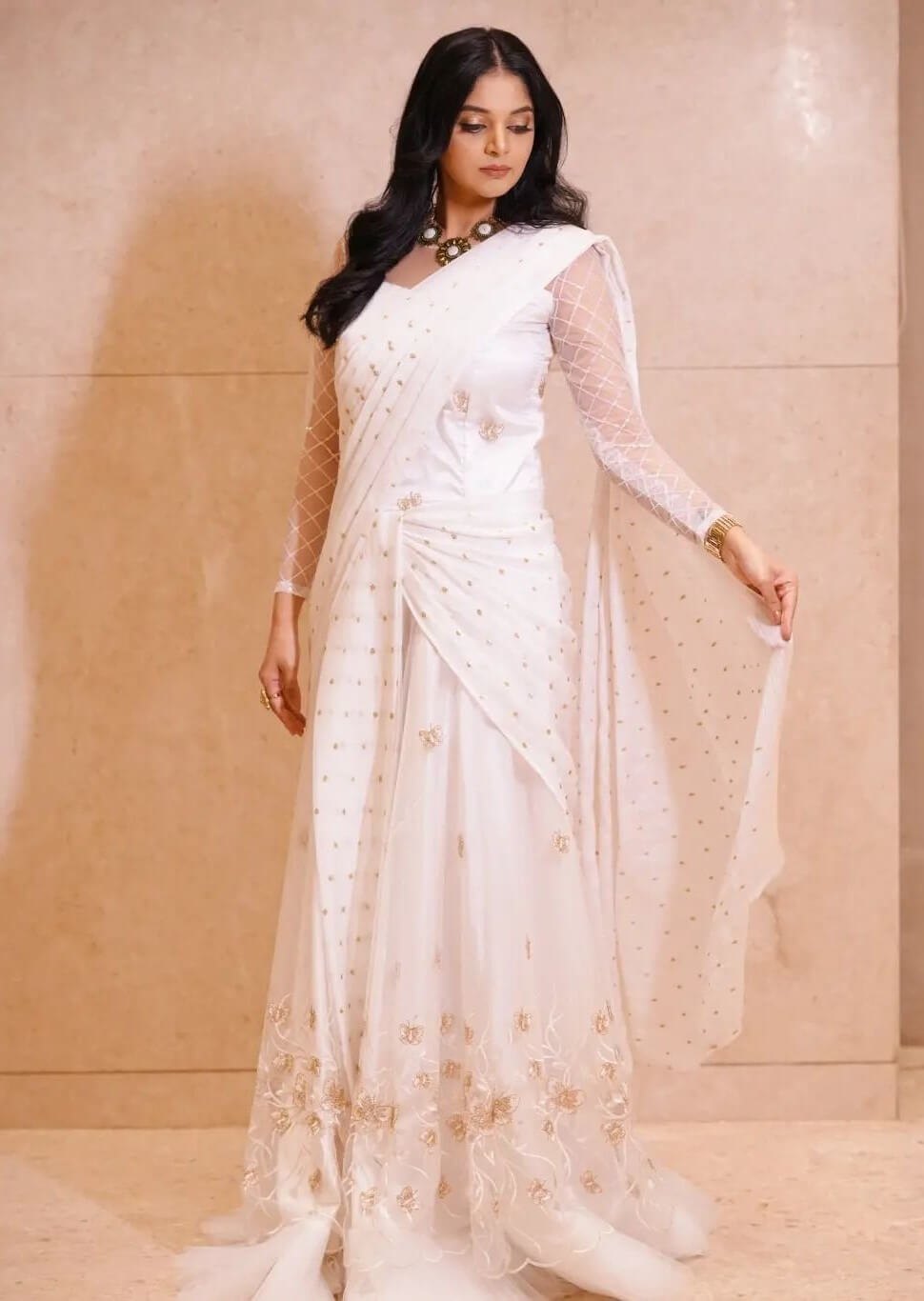 Sanam Shetty In White Chiffon Saree Paired With Full Sleeves Blouse