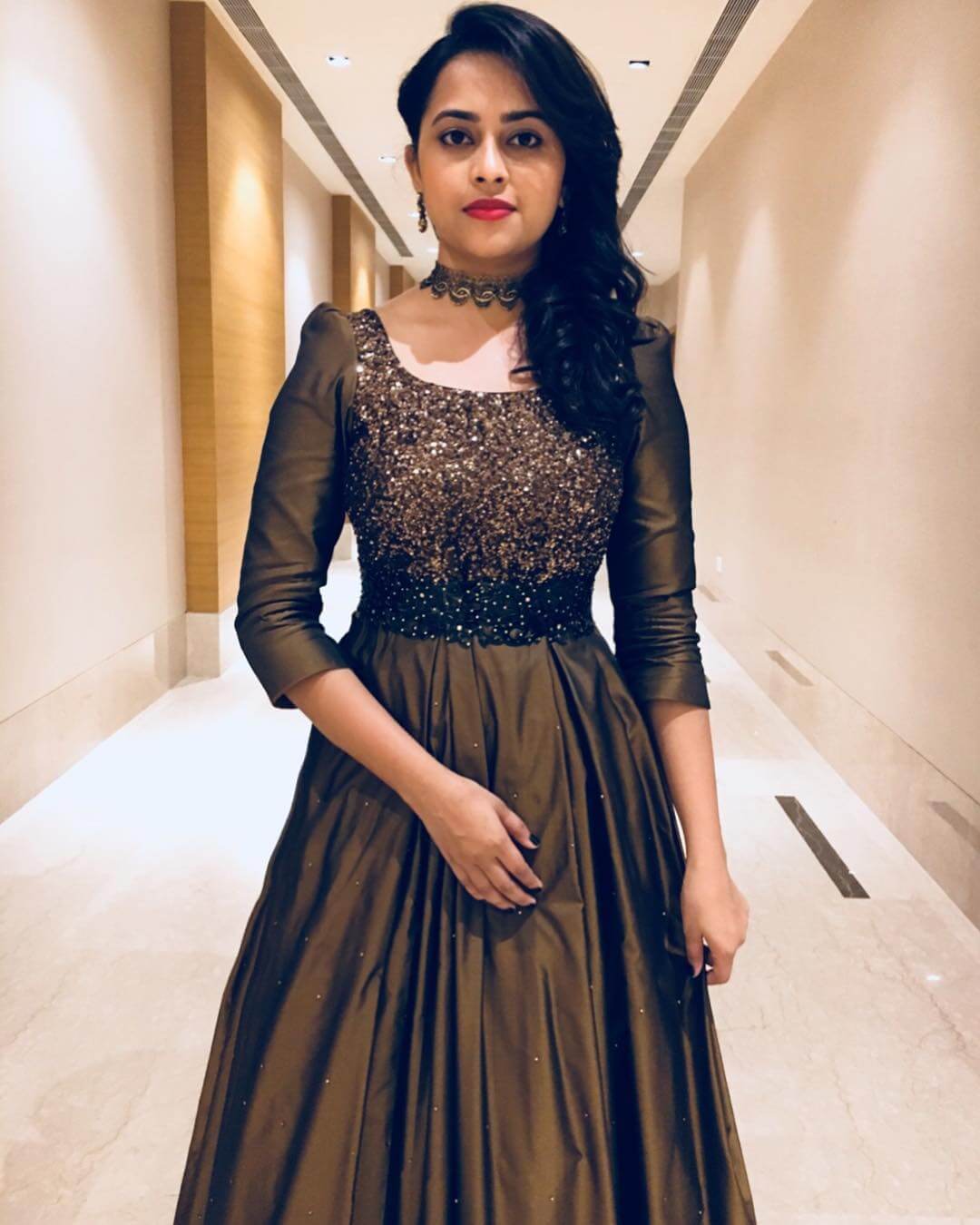Sri Divya Dazzling Look In Olive Green Evening Gown
