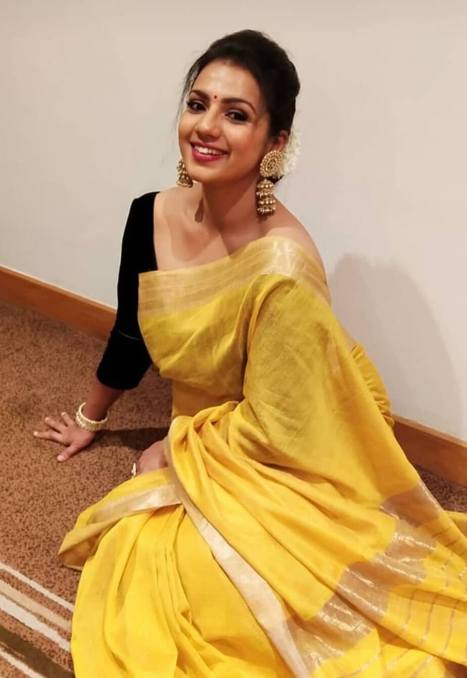 Sruthi Hariharan In Yellow Cotton Blend Saree Paired With Black Blouse