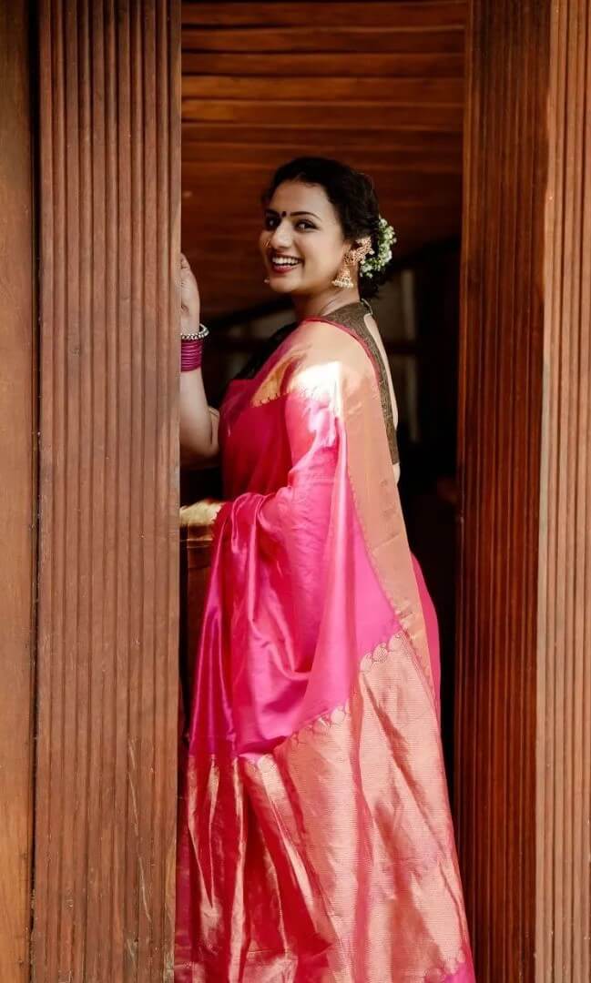 Sruthi Hariharan Traditional Avatar In Pink Silk Saree With Messy Hair Bun