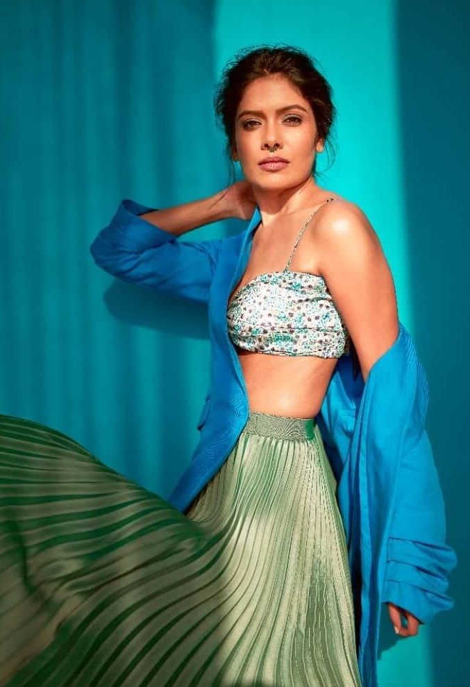 Suruchi Adarkar Sexy Look In Green Solid Pleated Skirt With Floral Print Crop Top & Blue Blazer