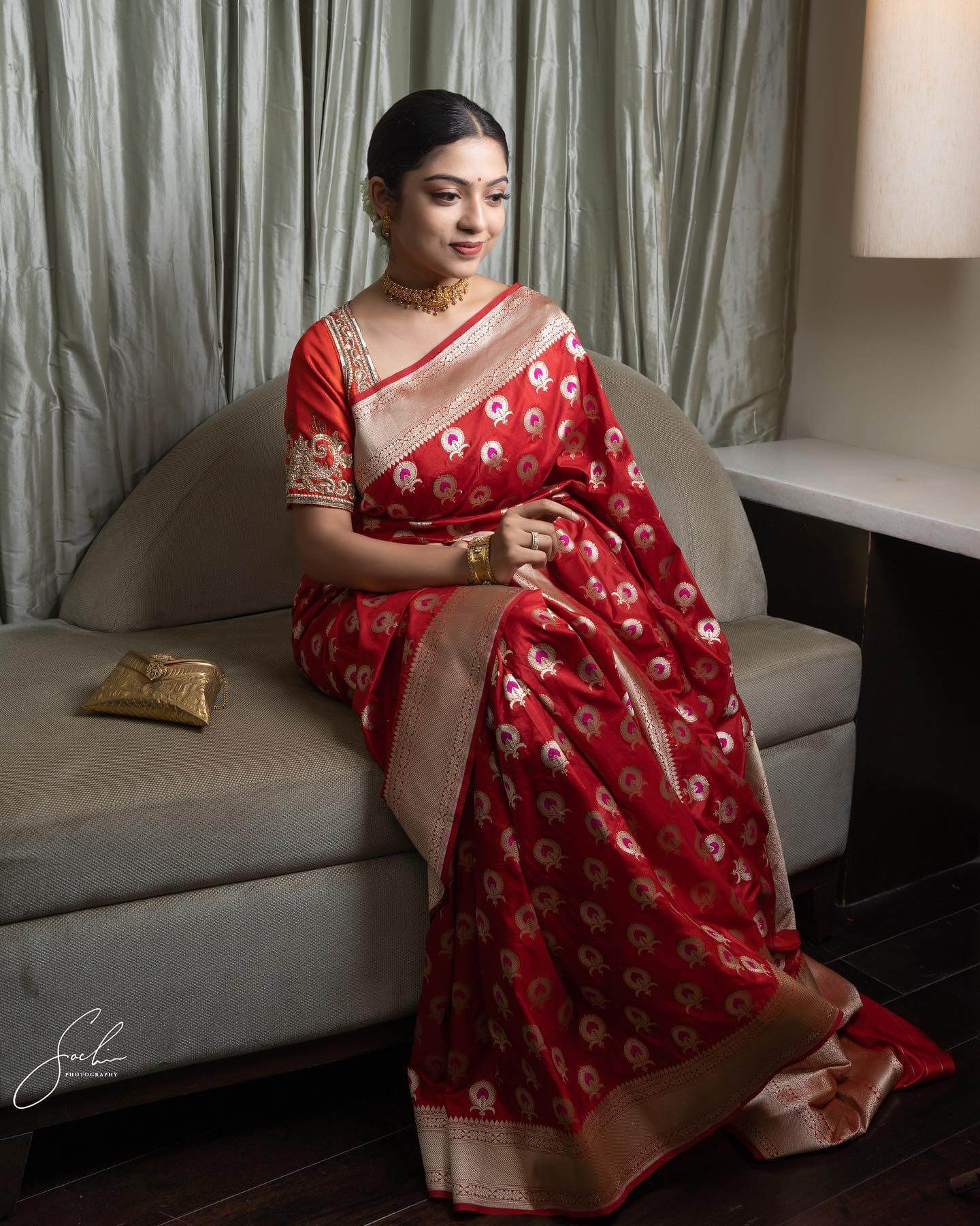 Varsha Bollamma Mesmerizing Look In Red Banarasi Silk Saree