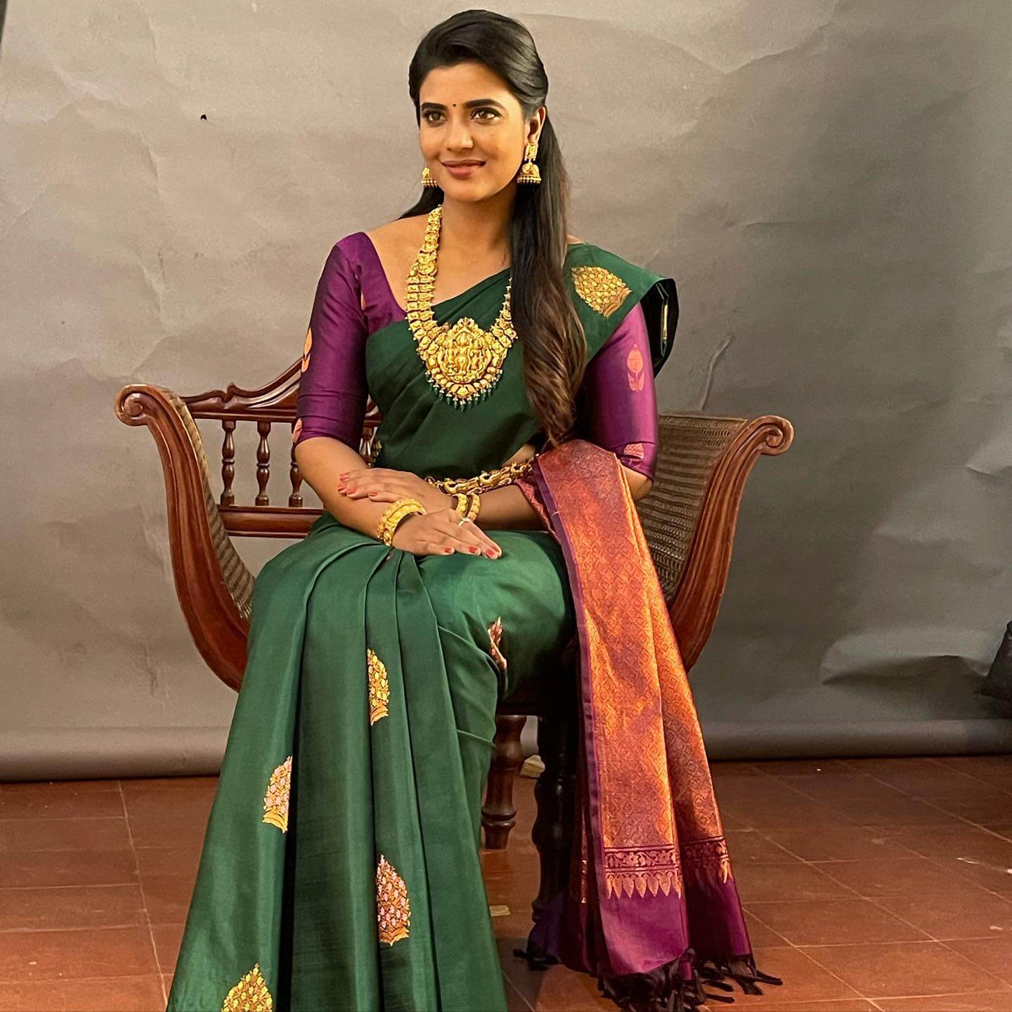 Aishwarya Rajesh In Dark Green Silk Saree With Purple Blouse Paired With Gold Temple Design Jewellery