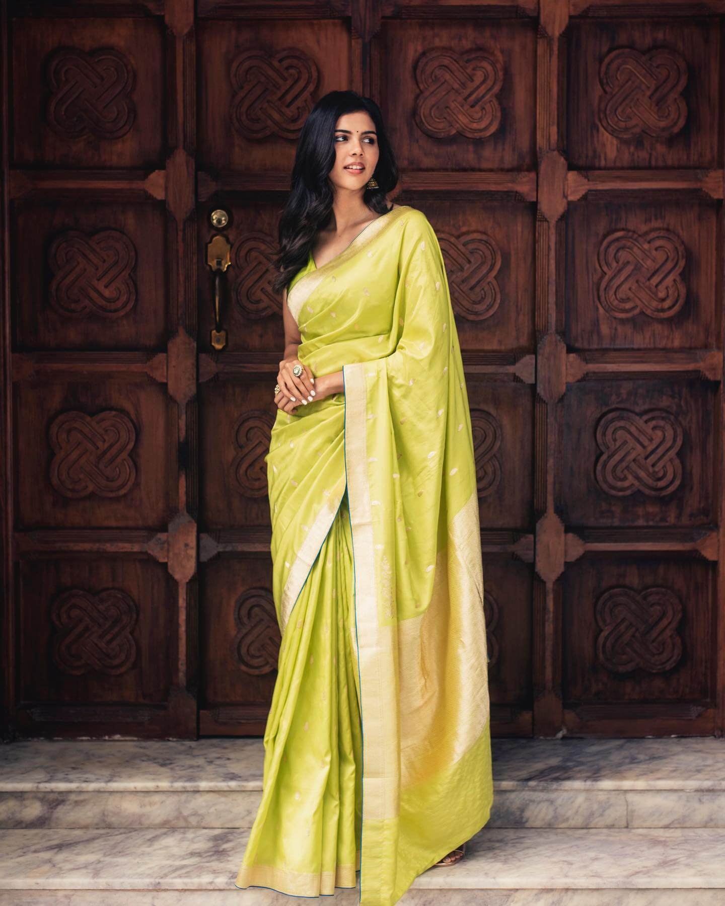 Kalyani Priyadarshan In Green Silk Saree Paired With V-Neck Sleeveless Blouse Outfits Looks