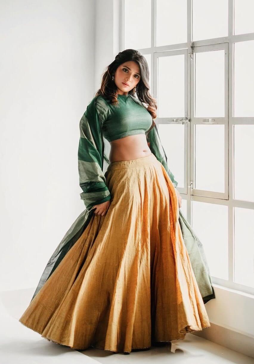 Aathmika In Green & Beige Solid Lehenga With Green And Golden Dupatta
