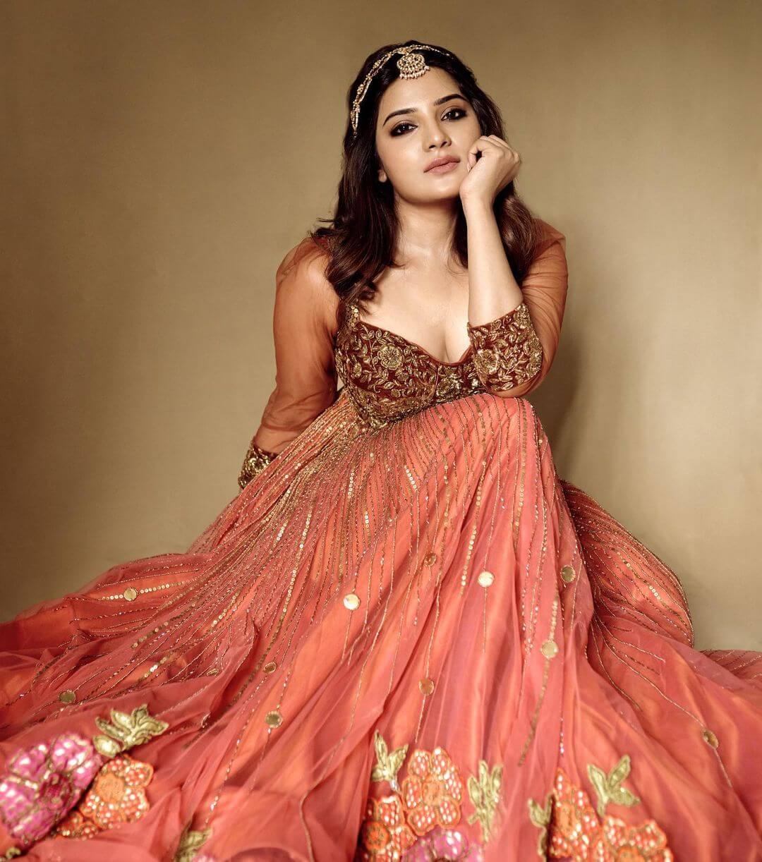 Aathmika In Maroon & Orange Deep Sweetheart Neck Golden Embroidery Gown Gives Us Royal Vibes