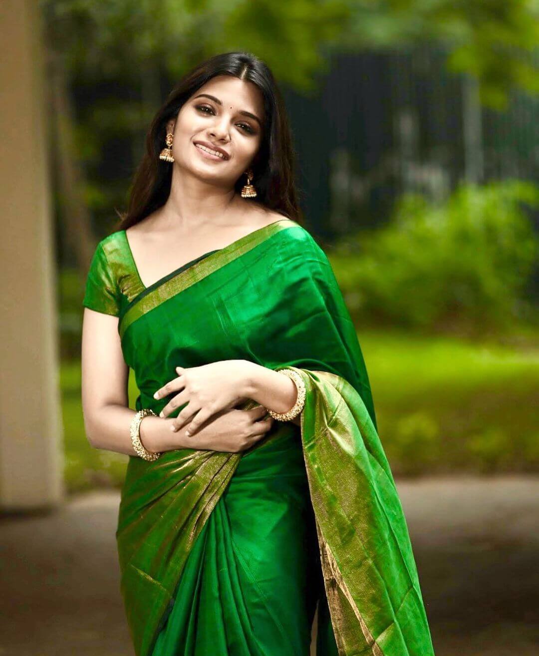 Aathmika Look Beautiful In Green Silk Saree With Half Sleeves Green Blouse