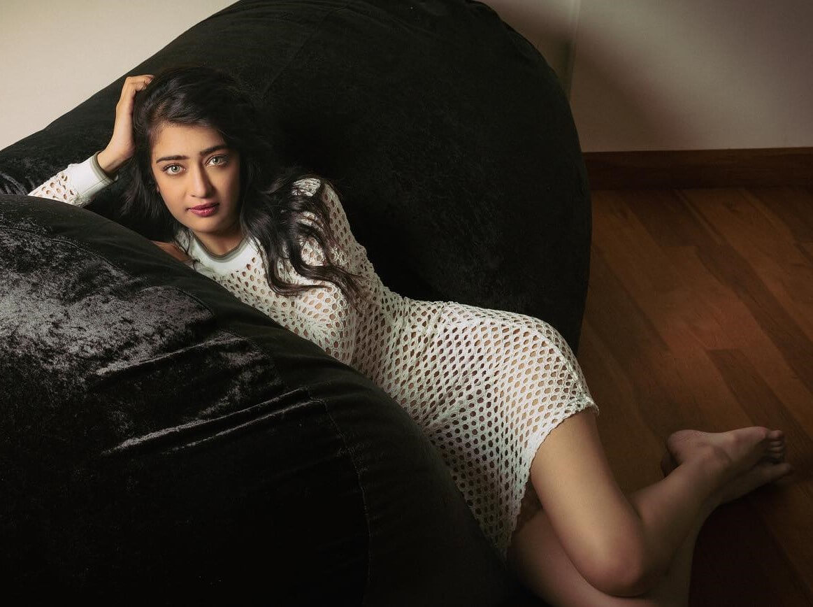 Akshara Haasan Strike A Pose In White Crochet  Full Sleeves Dress