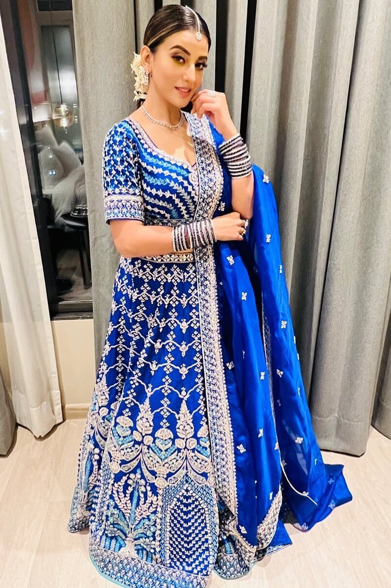 Akshara Singh Festive Look In Royal Blue Heavy Embroidered Lehenga Set With Sleek Hair Style