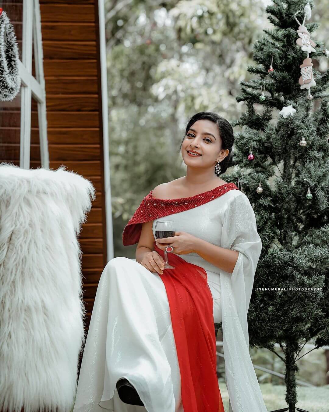 Alphy Panjikaran Flattering Look In White & Red Off Shoulder Dress Gives Us Christmas Vibes