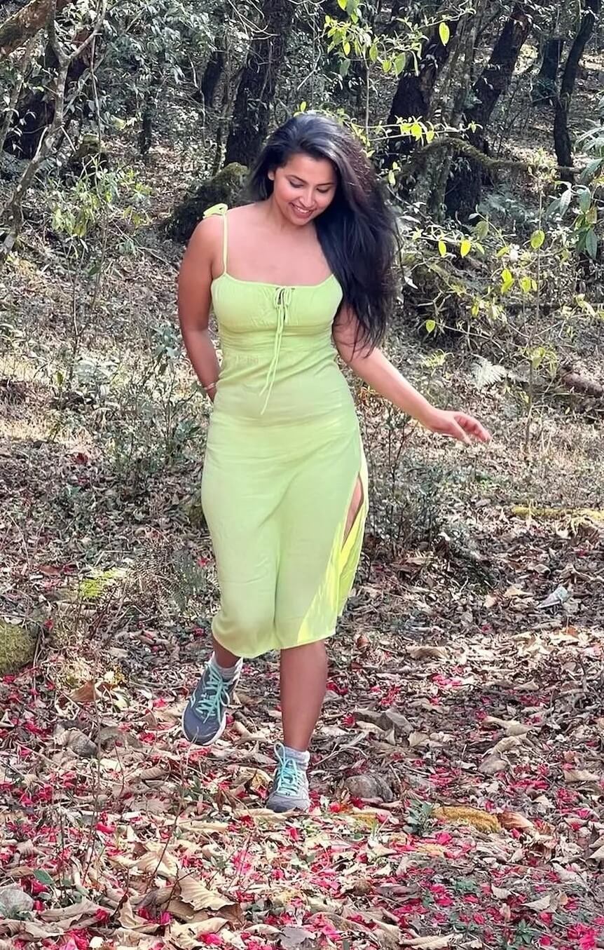 Anicka Vikraman Vibrant Look In Lime Green Silt Cut Dress With Sports Shoes
