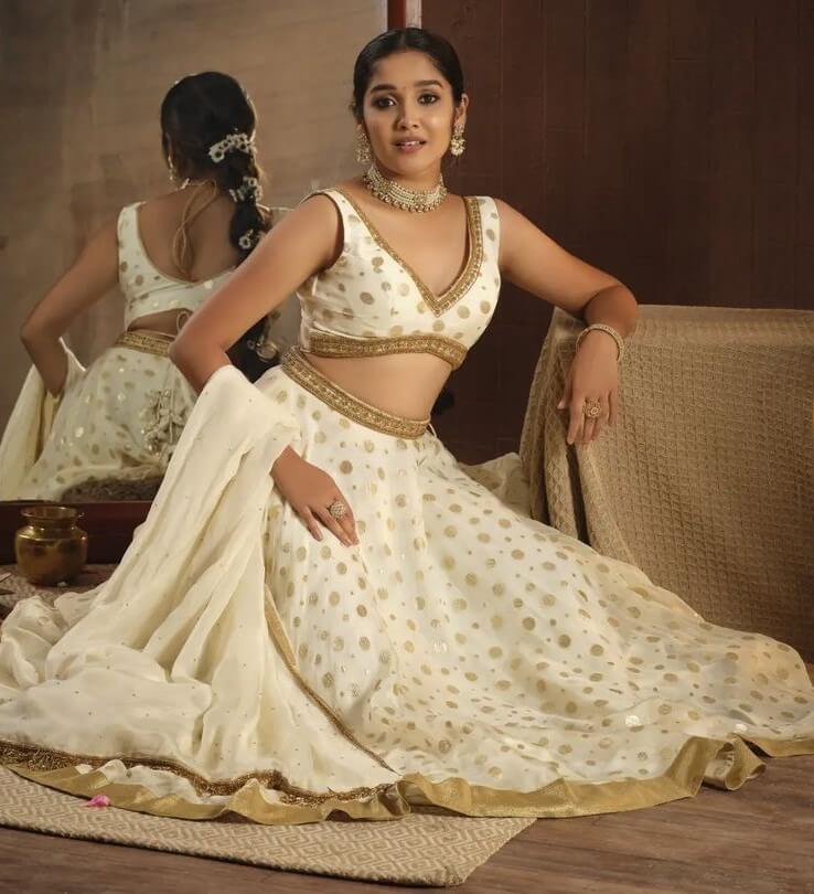 Anikha Surendran Look Ravishing In White Golden Embroidery Lehenga With V-Neck Sleeveless Blouse