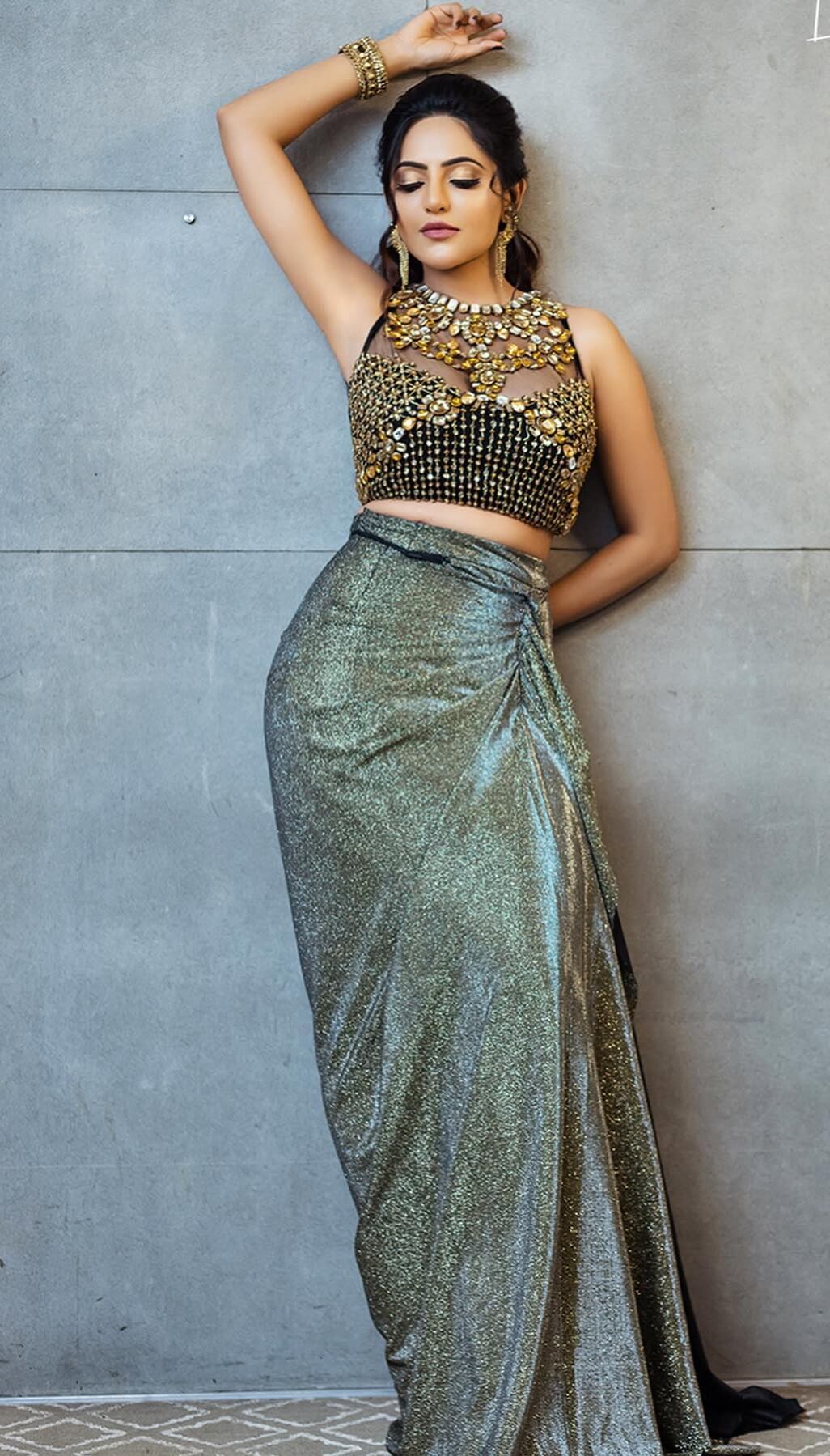 Athulya Ravi Tempting Look In Black Metallic Skirt With Golden Stone Embedded Sleeveless Top