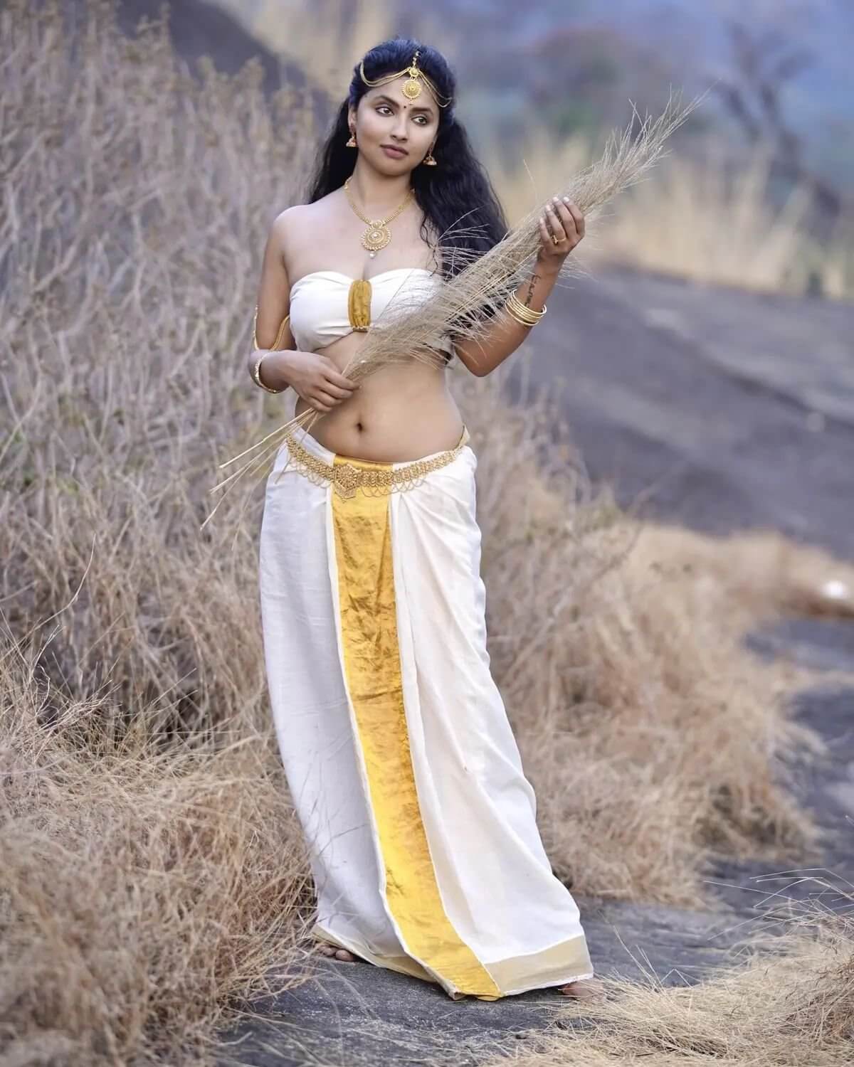 Beautiful Anicka Vikraman In Sexy Off White & Golden Tube Blouse With Drapped Skirt