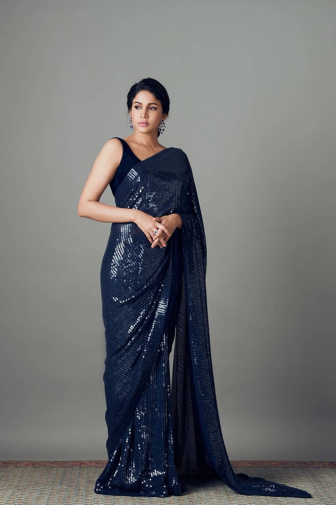 Beautiful Lavanya Tripathi In Fabulous Navy Blue Sequined Saree With Sleeveless Blouse