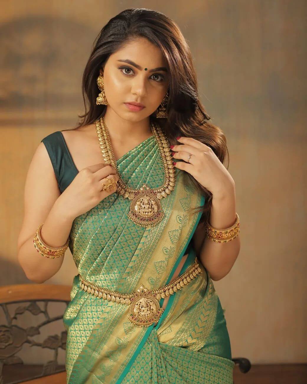 Beautiful Monica Chinnakotla In Blue & Golden Kanjeevaram Silk Saree With Traditional Temple Design Gold Jewellery Can Be Your Festive Look