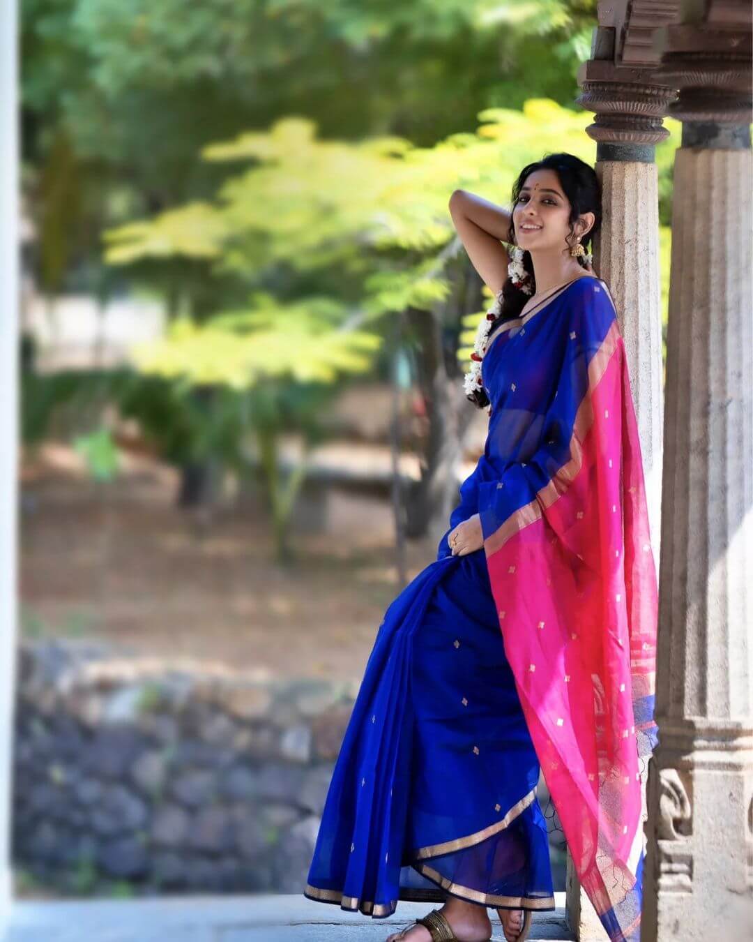 Desi Girl Riya Suman In Deep Blue Silk Saree Adorn With Pink Puffed Sleeves Blouse