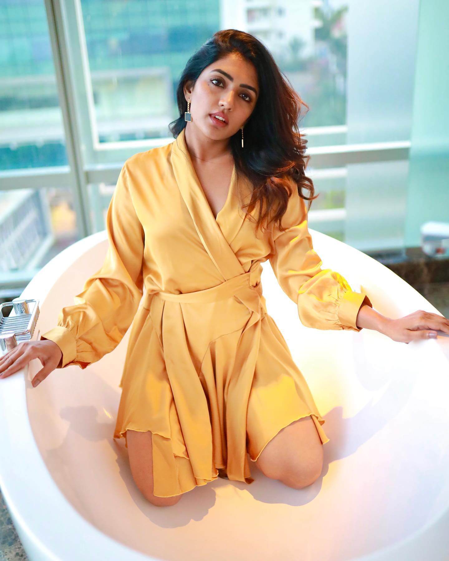 Eesha Rebba Looking A Class Apart In Satin Yellow Wrap Dress